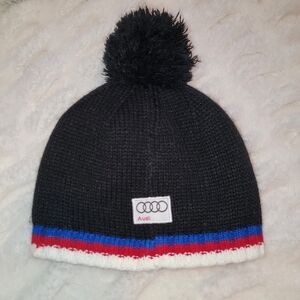 Kootenay Audi Black Knit Pom Beanie with Red & Blue Trim